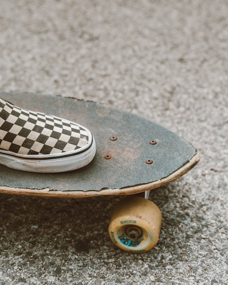 vans shoes on skateboard